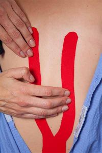 Kinesio taping a back